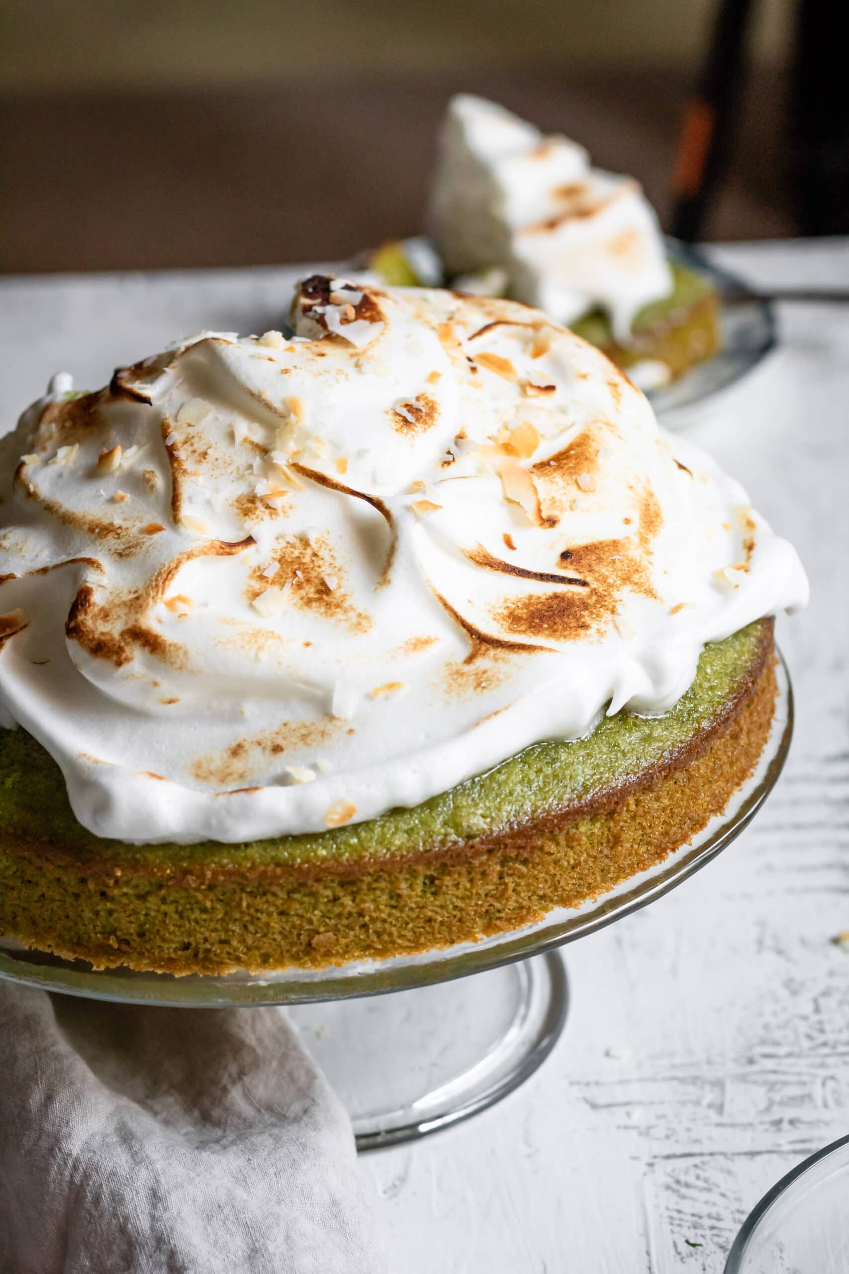 Matcha Cake with Meringue and Coconut Flakes