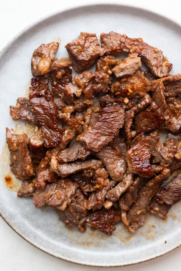 Cooked steak on a plate.