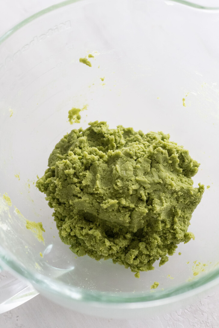 Matcha cookie dough in a stand mixer.