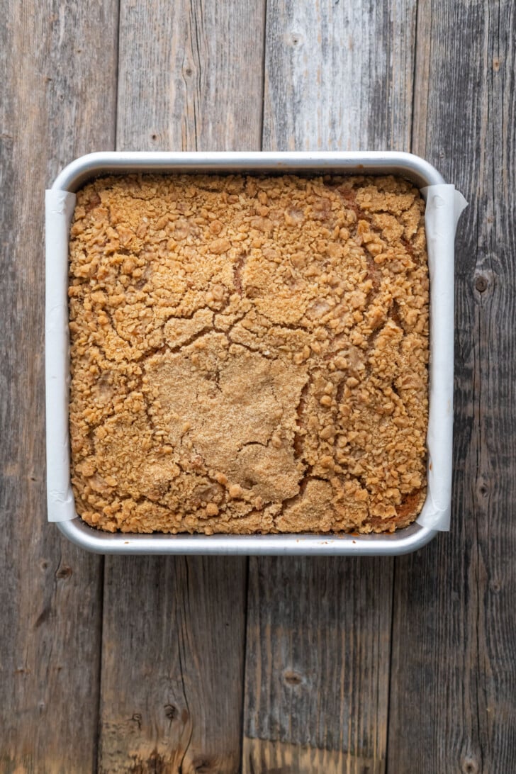 Baked Thai tea coffee cake in a baking pan.