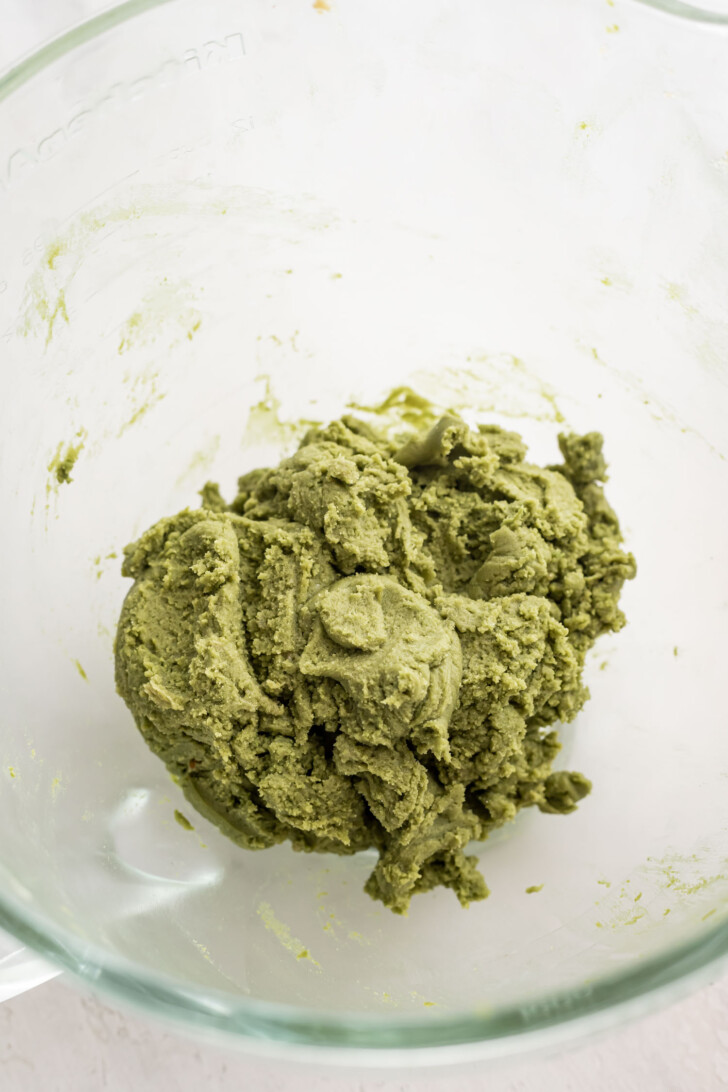 Matcha cookie dough in a mixing bowl.