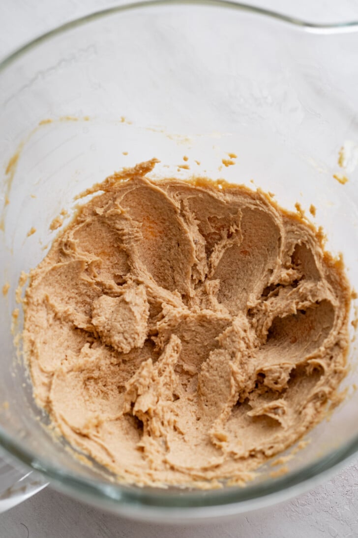 Mixed wet ingredients in a mixing bowl.