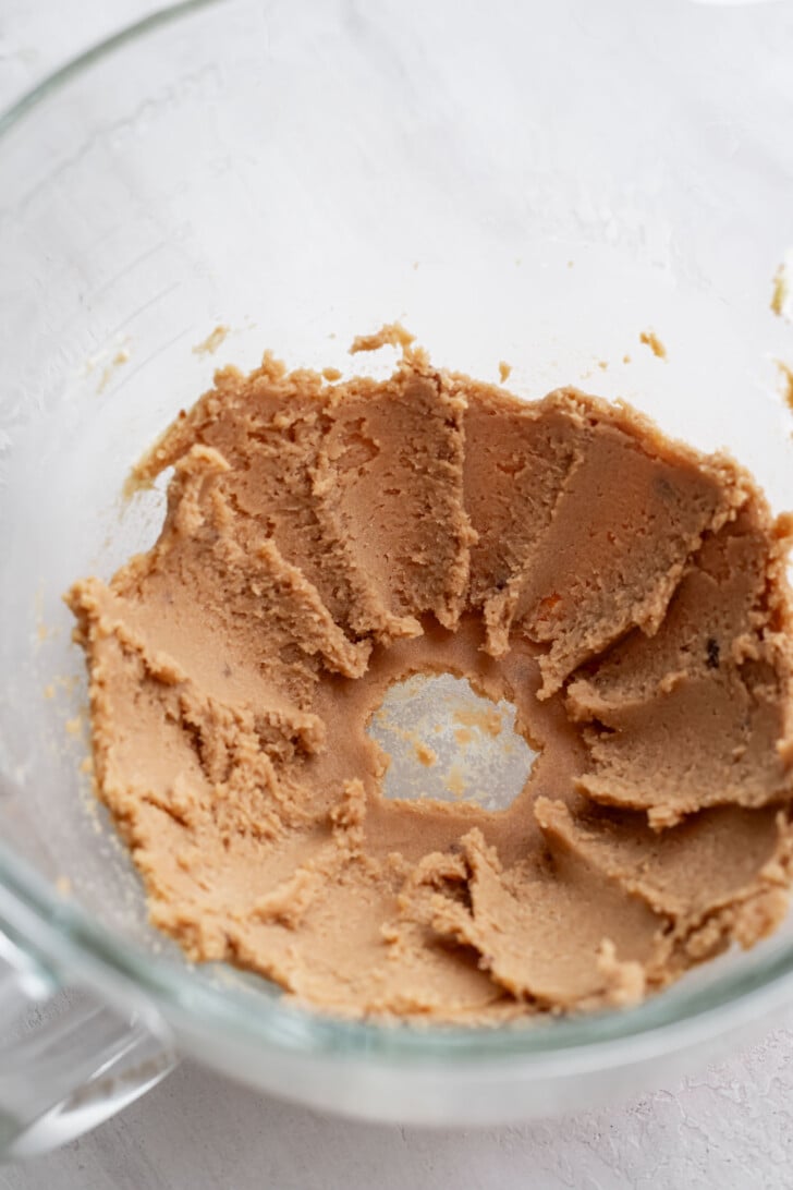 Mixed butter and sugar in a mixing bowl.