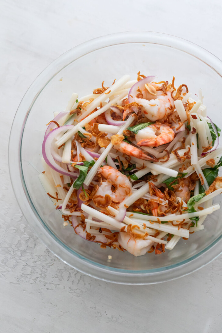 Mixed together lotus stem salad.