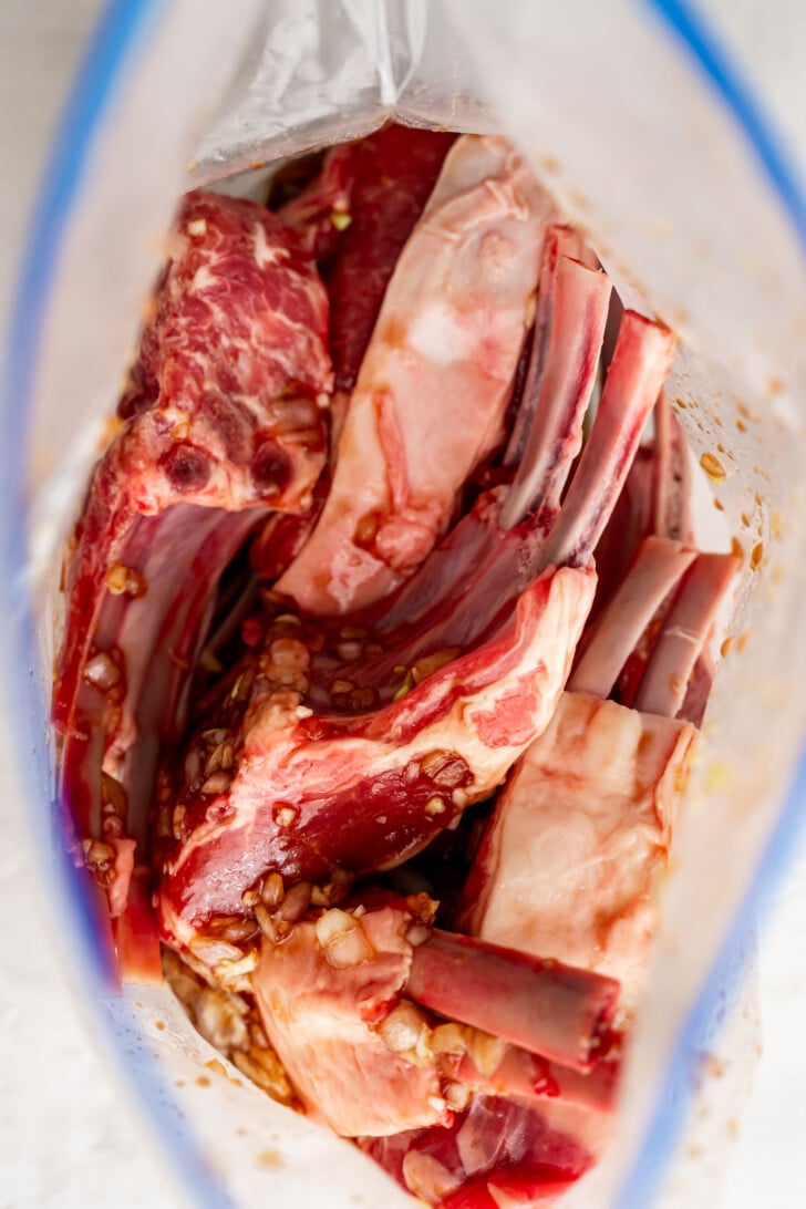 Marinating lamb chops in a Ziploc bag.