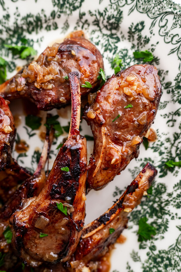 Lamb chops on a serving dish.