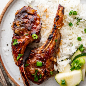Vietnamese caramelized lamb chops served with rice and zucchini.