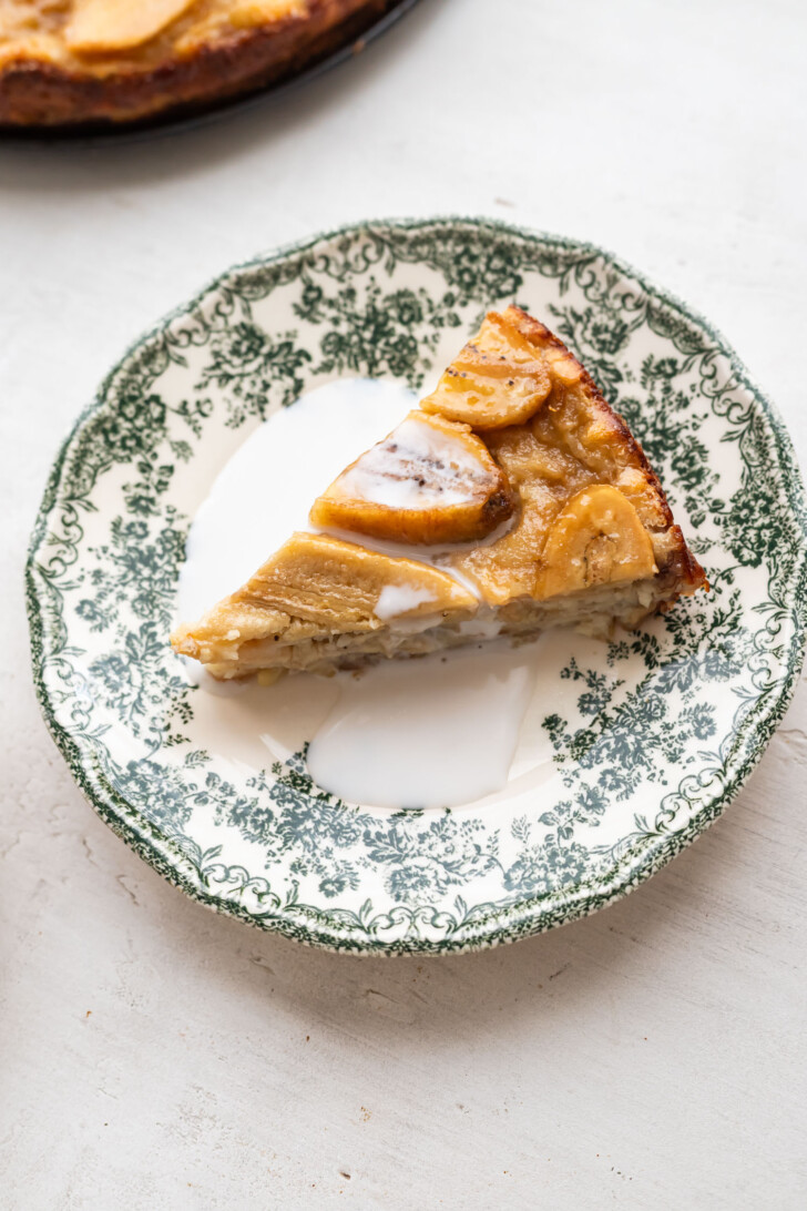 Coconut sauce on a slice of banana cake.